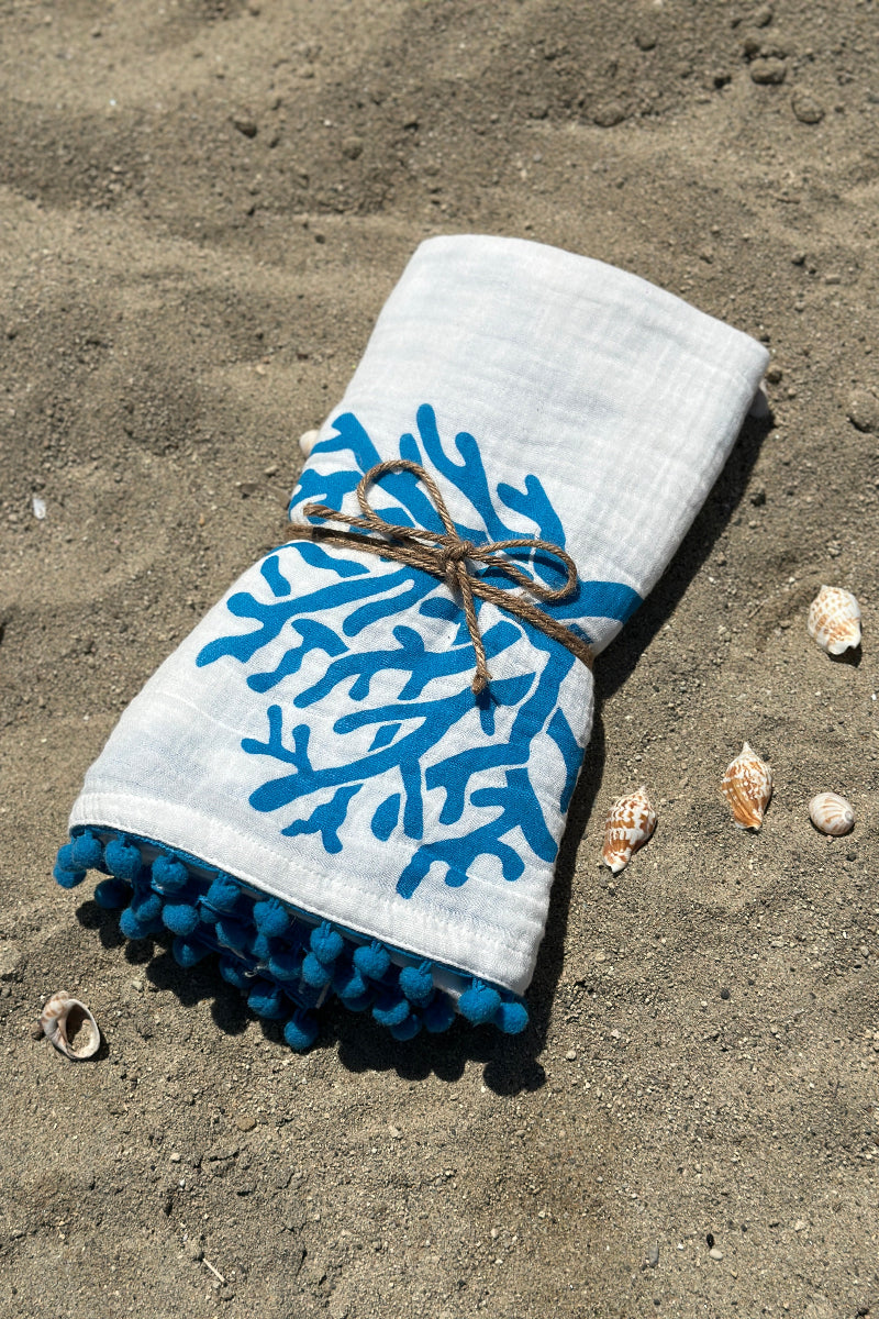 Telo-corallo-cotone-bianco-turchese