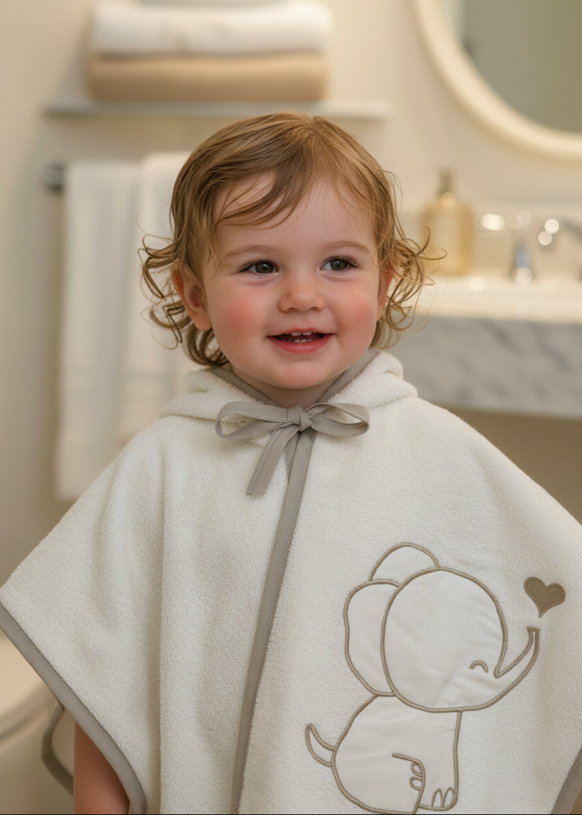 poncho-baby-elefante-grigio-bimbo